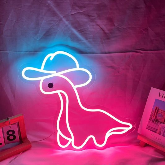 Neon sign of a dinosaur wearing a cowboy hat on a pink and purple fabric background.