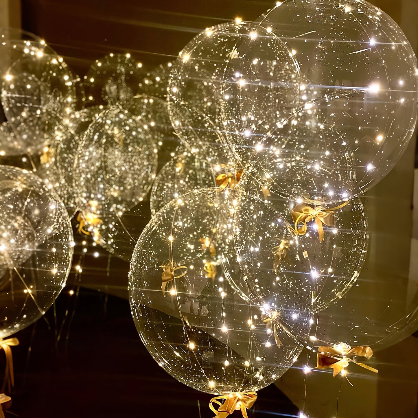 A Set of 9 LED String Lights with Glowing Transparent Bubble Balloons